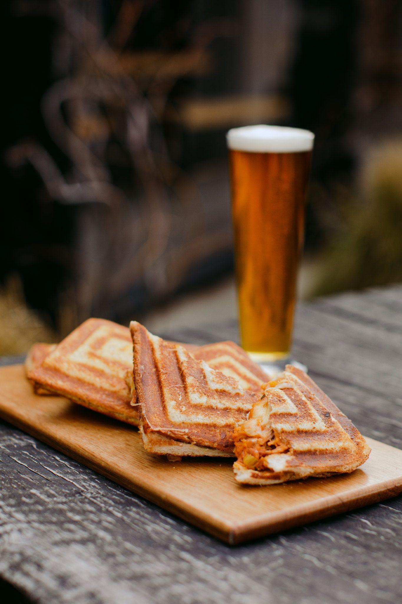 A pint of beer with a jaffle