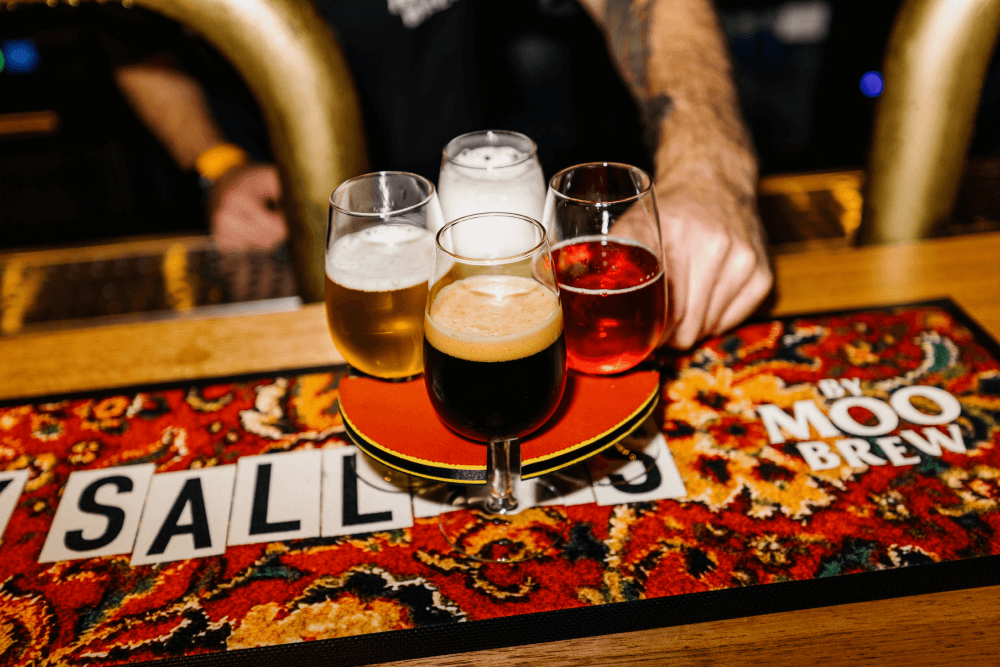 A paddle of four different beers